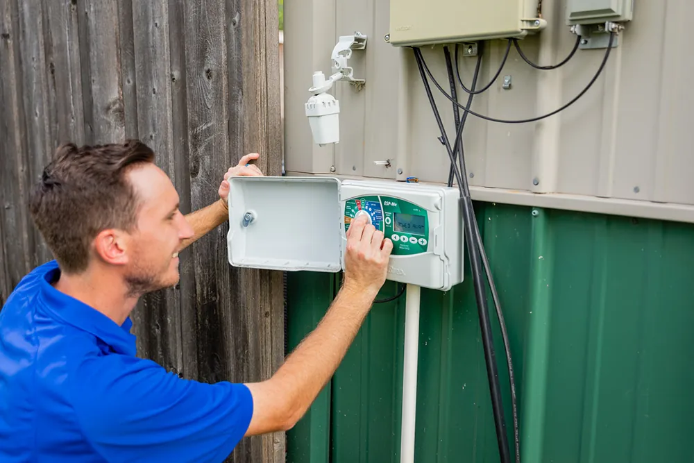 Aquamax technician on a Dallas sprinkler repair call